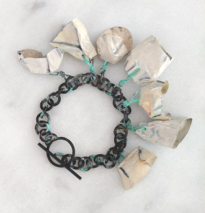 The New Charm Bracelet, 2023, Re-purposed oxidised and patinated brass chain and clasp, folded copper sheet, acrylic paint