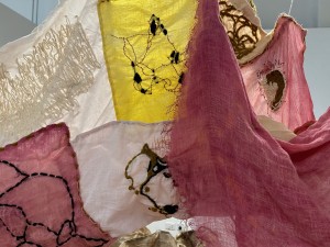 Eloise Tilbury, i bare it all yet still they do not see, Linen, cotton, raffia, brass wire, chicken wishbones, cotton embroidery thread and cotton yarn, 2025